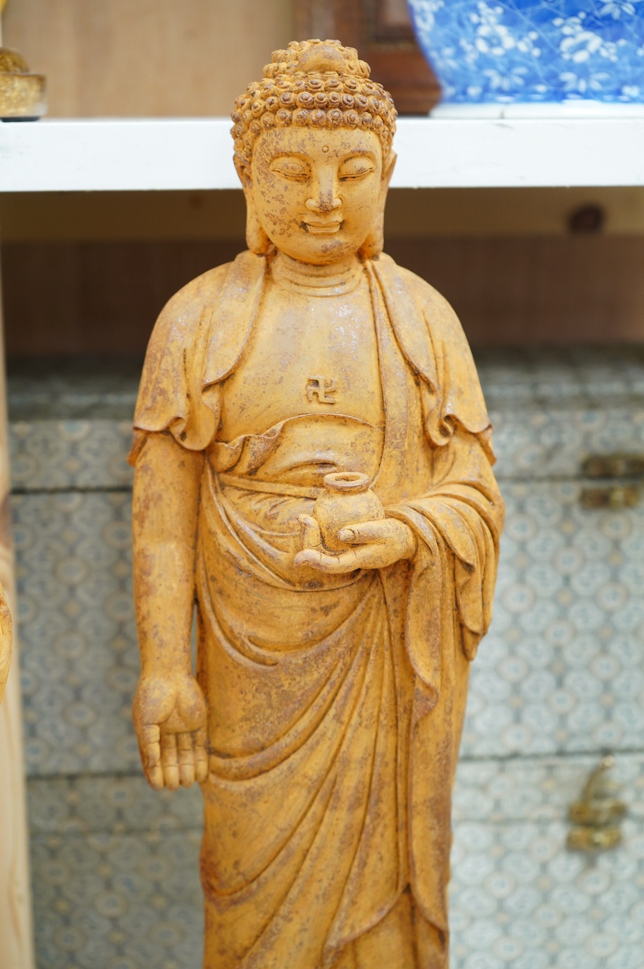 A set of three large Chinese patinated heavy glass figures of Bodhisattvas, tallest 49cm. Condition - good